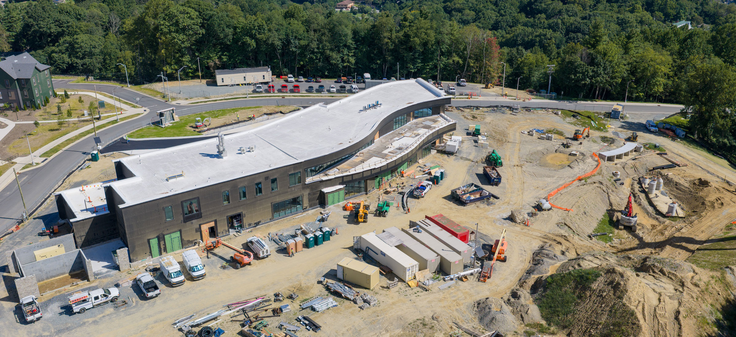 This aerial photo shows construction progress for the STEM Academic Building and Greenhouses project at App State Innovation District on the Boone campus