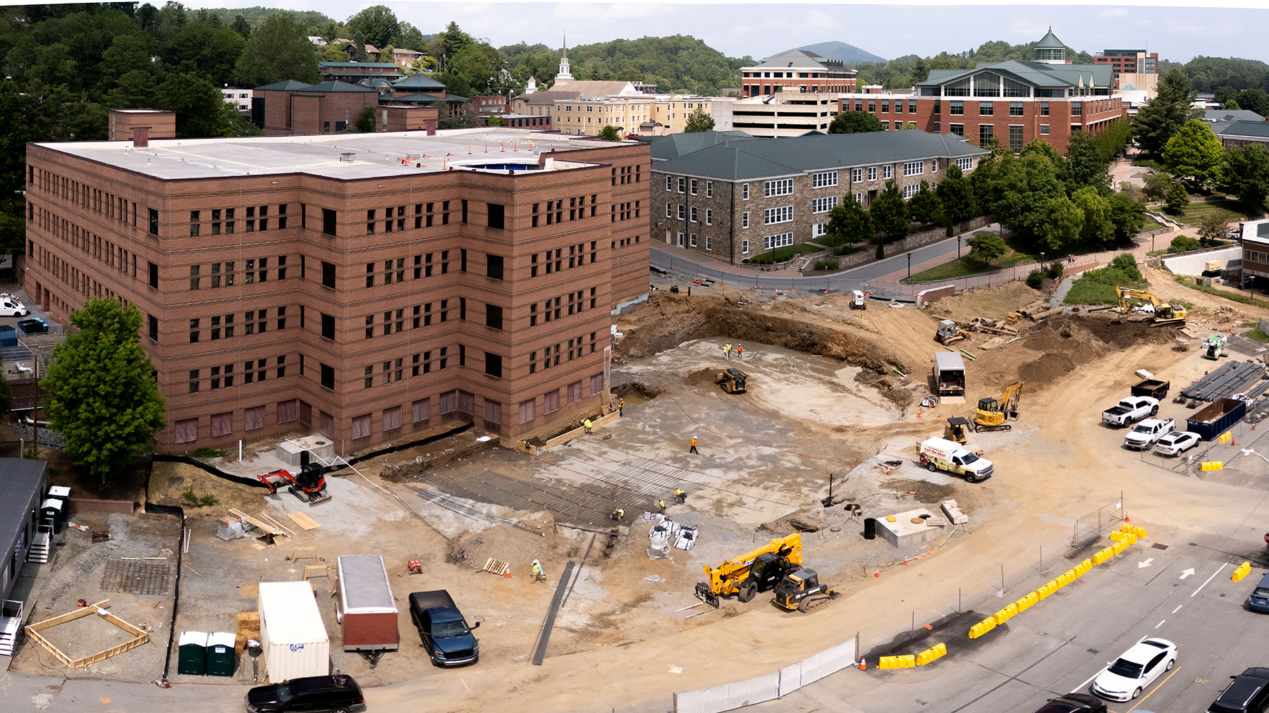 Workers install rebar at Peacock Hall site, June 11, 2025, for new foundation.