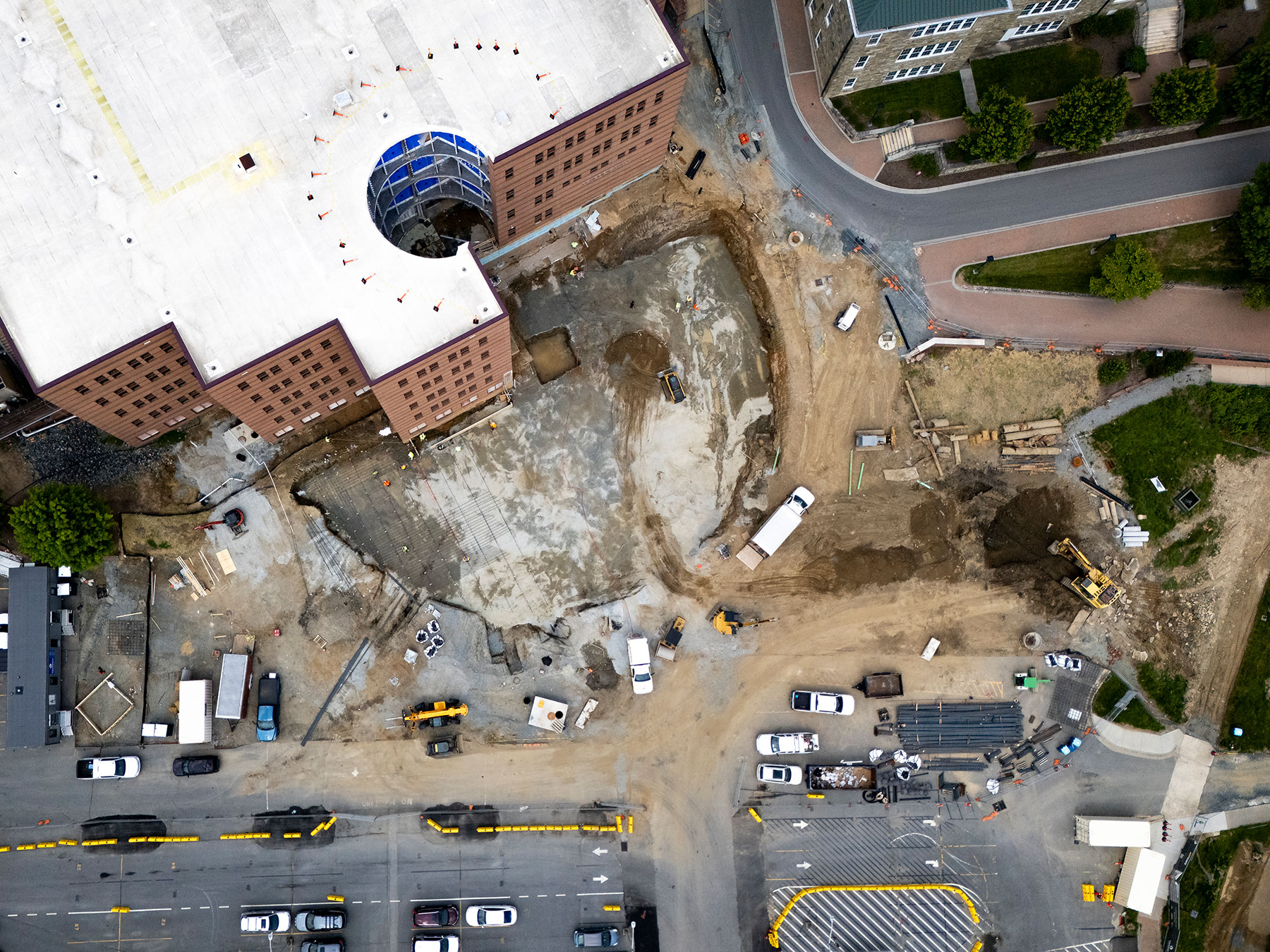 Aerial view of Peacock Hall site with rebar installation, June 11, 2025.